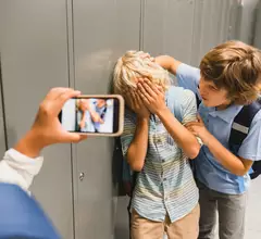Adolescent schoolkid bullying kids